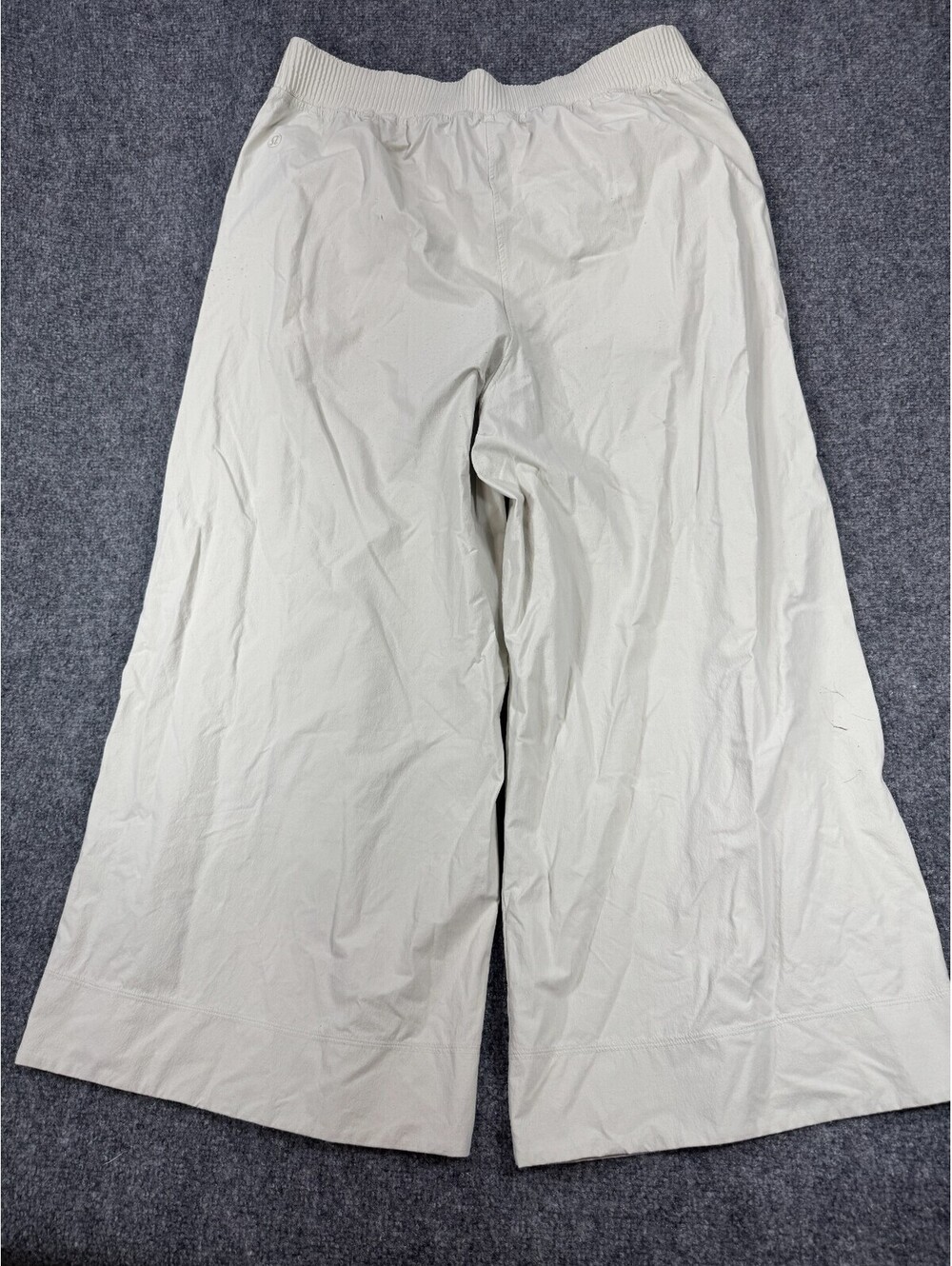 Lululemon Palazzo Pants women’s Size XL Beige Pockets Elastic Waist Ankle Slit